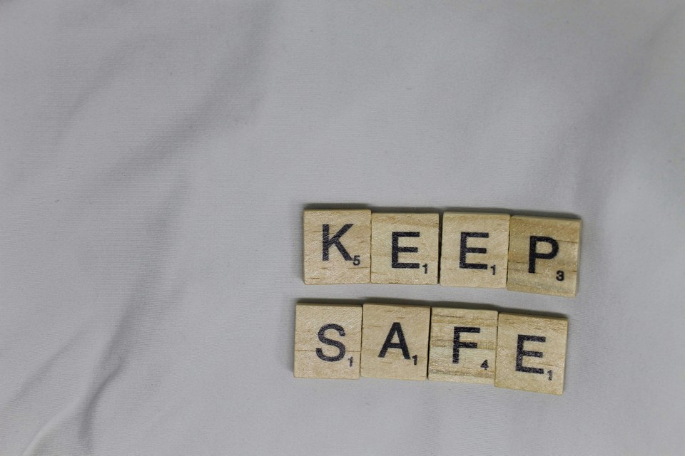 Scrabble tiles spelling "KEEP SAFE" β the illusion of safety that bankers create